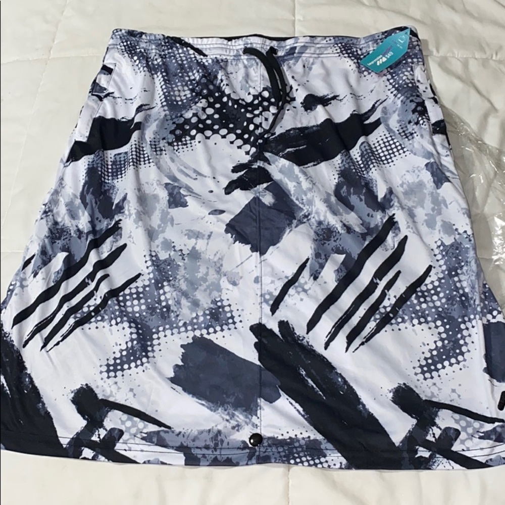 Brand new! Mod sports skirt w attached leggings.